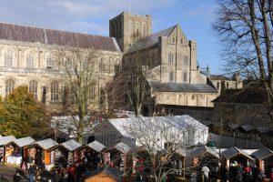 Winchester Cathedral and christmas market during the day