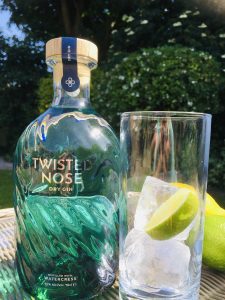 twisted nose gin bottle with a cocktail