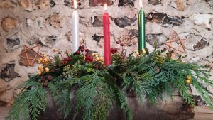 Candles and yuletide ferns